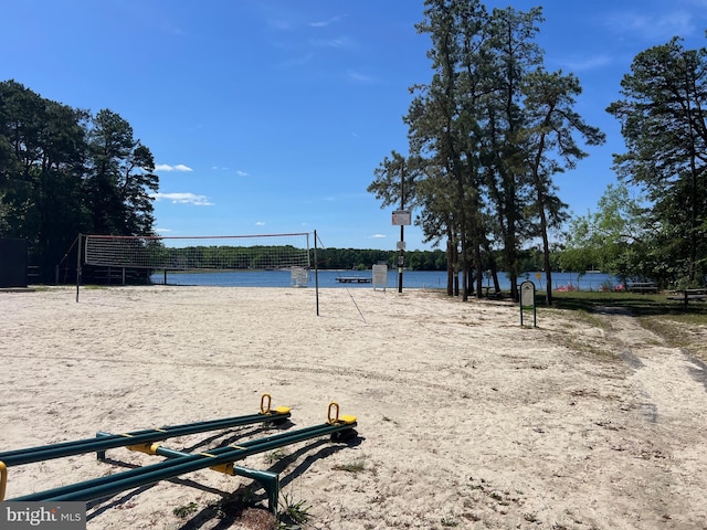 view of property's community featuring volleyball court