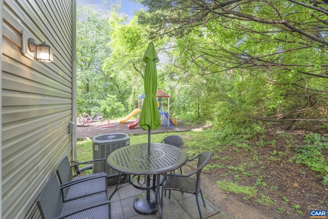 1731 Webland Park, Charlottesville, VA 22901 - view of patio with central AC unit, a playground, and outdoor dining space