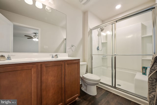 45 Quigley Ct, Camden Wyoming, DE 19934 - full bath featuring wood finished floors, a stall shower, toilet, double vanity, and ceiling fan