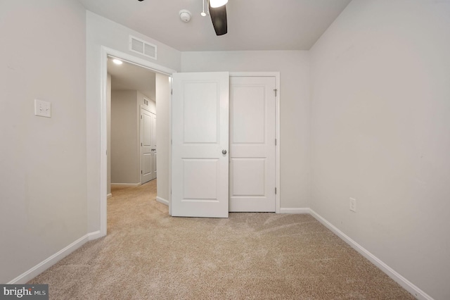 45 Quigley Ct, Camden Wyoming, DE 19934 - unfurnished bedroom with light carpet, baseboards, a ceiling fan, and a closet