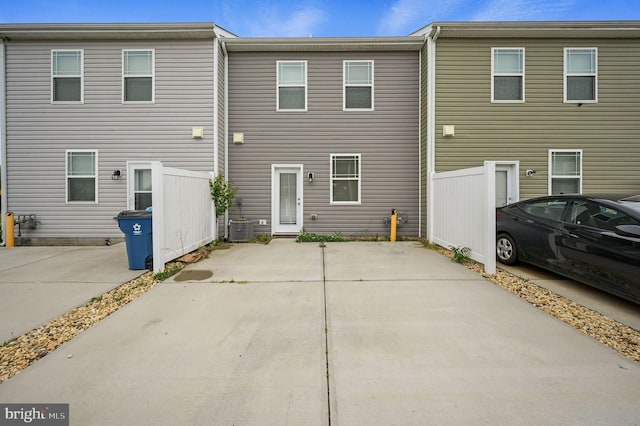 45 Quigley Ct, Camden Wyoming, DE 19934 - rear view of house featuring central AC