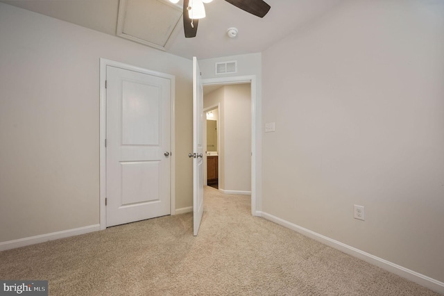 45 Quigley Ct, Camden Wyoming, DE 19934 - unfurnished bedroom with light carpet, baseboards, and ceiling fan