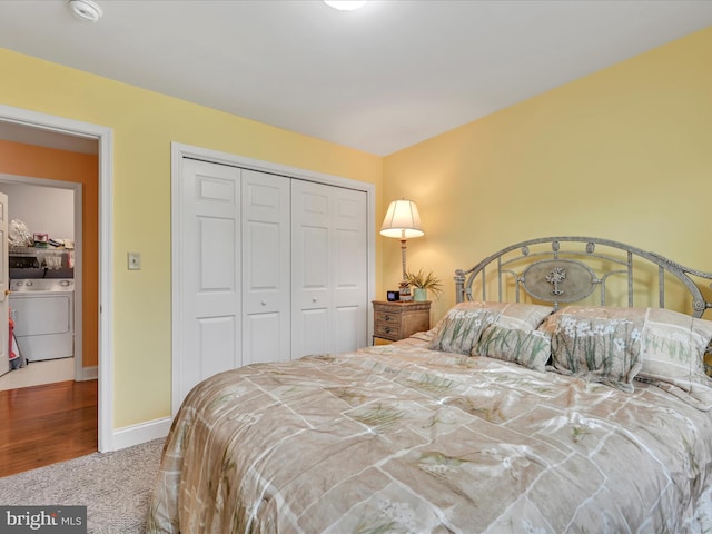 7705 Forney Way, Harrisburg, PA 17112 - bedroom with washing machine and clothes dryer, carpet flooring, a closet, and baseboards