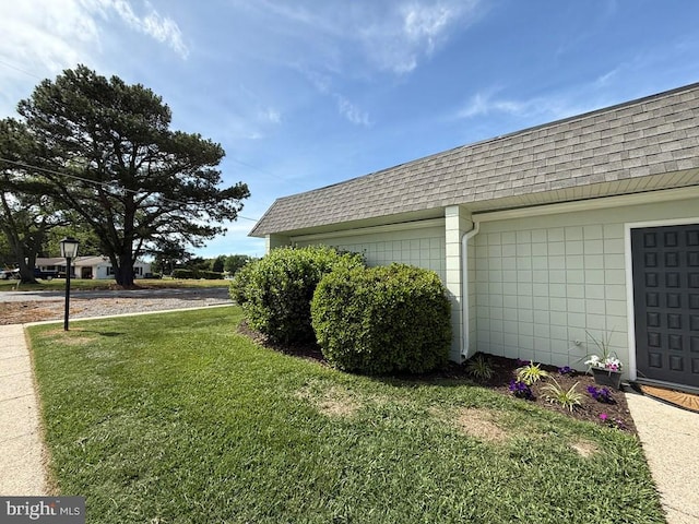 195 S Dr Unit E6, Kilmarnock, VA 22482 - view of property exterior featuring roof with shingles, a yard, and mansard roof