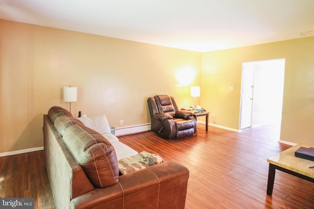 415 Garnet Dr, Burlington, NJ 08016 - living area featuring wood finished floors, a baseboard radiator, and baseboards