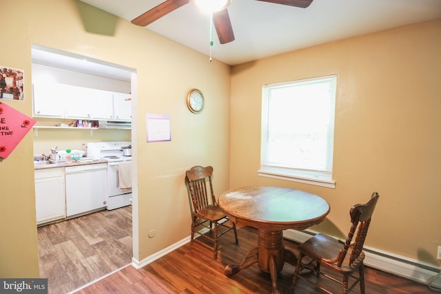 415 Garnet Dr, Burlington, NJ 08016 - dining room featuring a ceiling fan, light wood finished floors, and baseboards