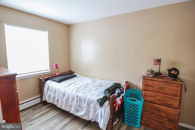 415 Garnet Dr, Burlington, NJ 08016 - bedroom with a baseboard radiator, wood finished floors, and baseboards