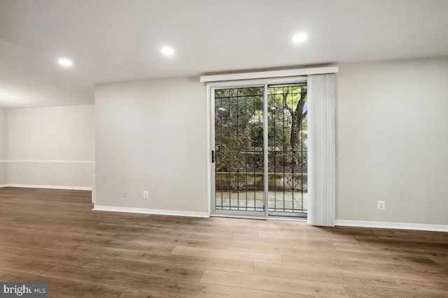 1900 Lyttonsville Rd Unit 216, Silver Spring, MD 20910 - spare room with wood finished floors, recessed lighting, and baseboards