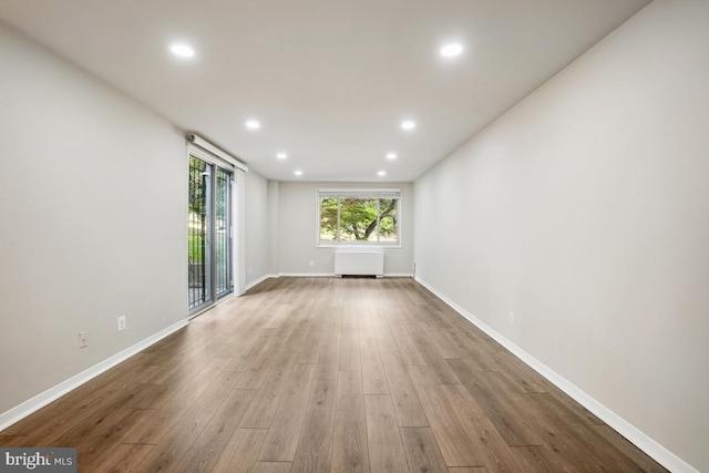 1900 Lyttonsville Rd Unit 216, Silver Spring, MD 20910 - empty room with wood finished floors, recessed lighting, and baseboards