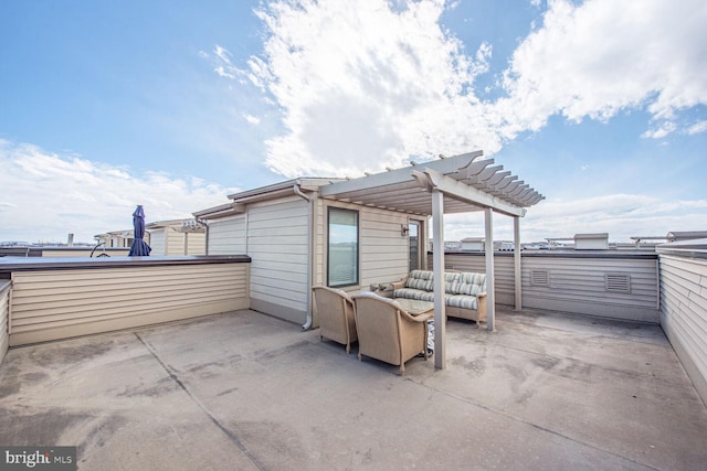 view of patio / terrace with an outdoor living space and a pergola