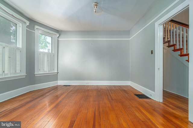 116 Price St, West Chester, PA 19382 - unfurnished room with hardwood / wood-style floors, stairs, and baseboards