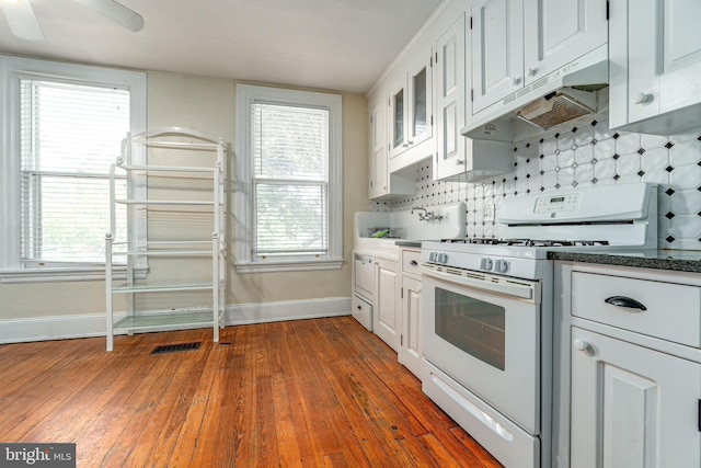 116 Price St, West Chester, PA 19382 - kitchen with white range with gas cooktop, baseboards, white cabinetry, and wood finished floors