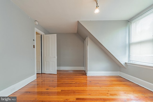116 Price St, West Chester, PA 19382 - bonus room with light wood-type flooring, baseboards, and vaulted ceiling