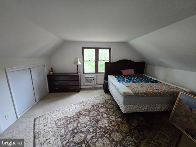 33 Middlebury Ln, Willingboro, NJ 08046 - bedroom with light colored carpet, vaulted ceiling, and a wall mounted AC