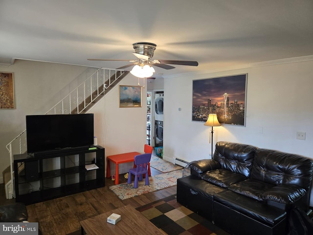 33 Middlebury Ln, Willingboro, NJ 08046 - living room featuring stacked washer and clothes dryer, a ceiling fan, wood finished floors, ornamental molding, and stairway