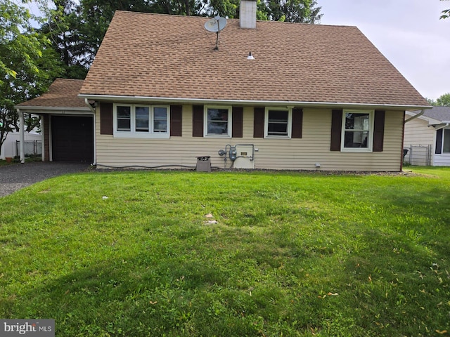 33 Middlebury Ln, Willingboro, NJ 08046 - view of front of house with a garage, a chimney, asphalt driveway, and a shingled roof