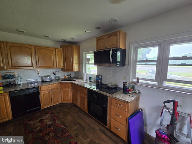 33 Middlebury Ln, Willingboro, NJ 08046 - kitchen featuring black appliances, dark wood-style flooring, decorative backsplash, light stone counters, and recessed lighting