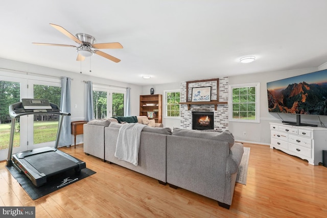 120 Appleview Ct, Locust Grove, VA 22508 - living area with wood finished floors, ceiling fan, a brick fireplace, and plenty of natural light