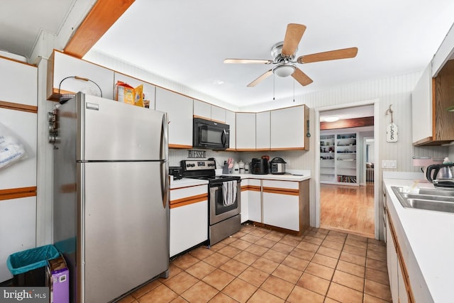 120 Appleview Ct, Locust Grove, VA 22508 - kitchen with stainless steel appliances, light countertops, ceiling fan, and light tile patterned floors