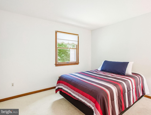 1021 Carson Dr, Huntingtown, MD 20639 - carpeted bedroom featuring baseboards