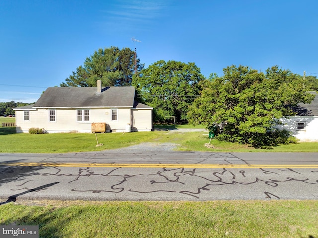 24532 Deep Branch Rd, Georgetown, DE 19947 - view of front of property featuring a front yard and a chimney