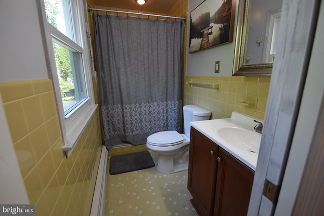 194 Irene Ave, Pasadena, MD 21122 - bathroom featuring tile walls, baseboard heating, vanity, toilet, and a shower with shower curtain