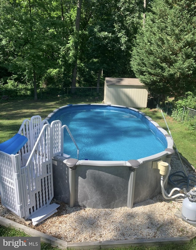 194 Irene Ave, Pasadena, MD 21122 - outdoor pool with a storage shed and an outbuilding