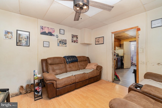 346 W Burkhart Ave, Chambersburg, PA 17201 - living room with wood finished floors, a ceiling fan, and a paneled ceiling