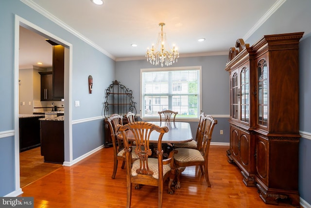 4 Bernadette Cir, Monmouth Junction, NJ 08852 - dining area featuring a chandelier, light wood finished floors, baseboards, recessed lighting, and crown molding