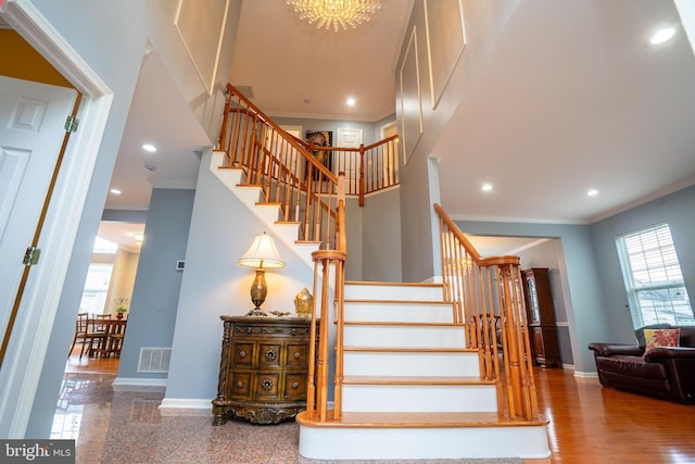 4 Bernadette Cir, Monmouth Junction, NJ 08852 - stairway featuring ornamental molding, baseboards, a chandelier, and recessed lighting