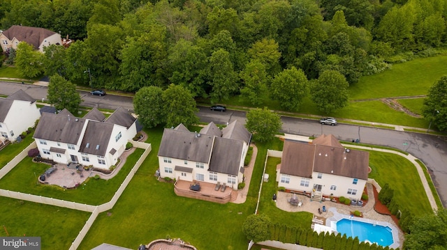 4 Bernadette Cir, Monmouth Junction, NJ 08852 - aerial perspective of suburban area featuring a pool area and a forest