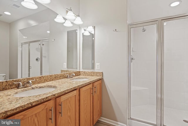 7222 Elkridge Crossing Way, Elkridge, MD 21075 - full bathroom with a shower stall, double vanity, and toilet