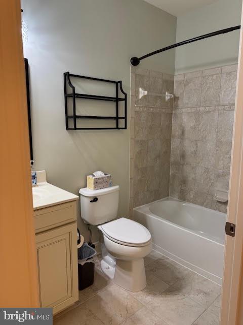 9200 Charleston Dr Unit 207, Manassas, VA 20110 - bathroom featuring toilet, shower / bath combination, and vanity