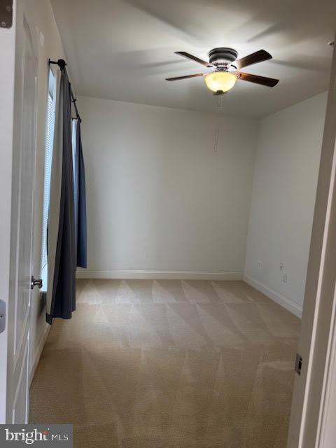 9200 Charleston Dr Unit 207, Manassas, VA 20110 - unfurnished room featuring light carpet, ceiling fan, and baseboards