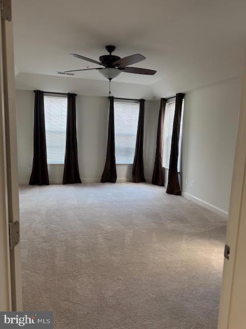 9200 Charleston Dr Unit 207, Manassas, VA 20110 - carpeted empty room featuring ceiling fan, plenty of natural light, and baseboards