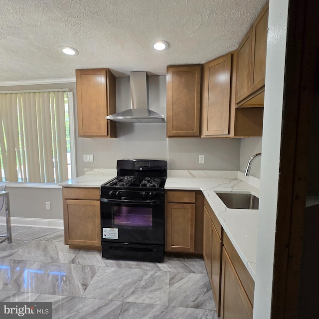 9711 Dilston Rd, Silver Spring, MD 20903 - kitchen featuring wall chimney range hood, black gas range, a sink, brown cabinets, and a textured ceiling
