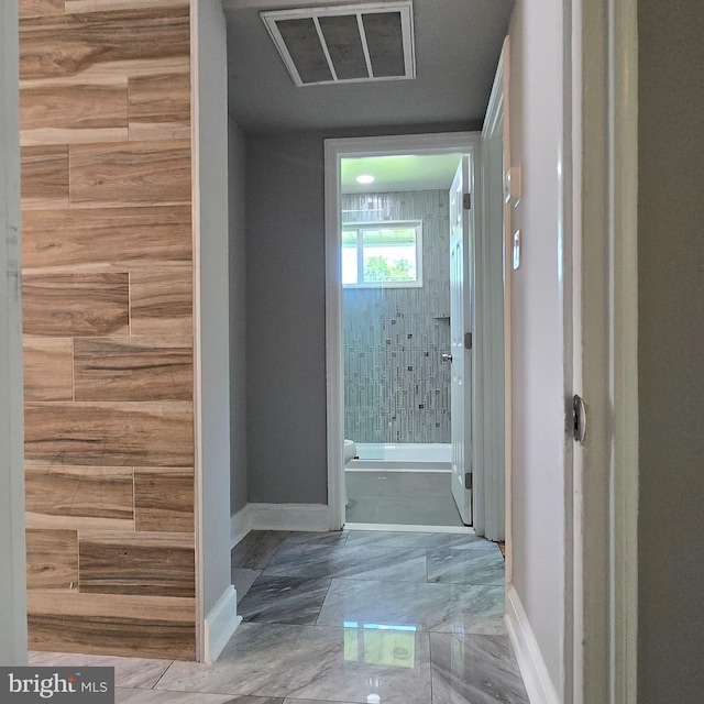 9711 Dilston Rd, Silver Spring, MD 20903 - corridor featuring baseboards and marble finish flooring