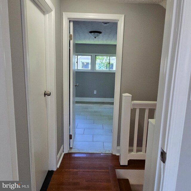 9711 Dilston Rd, Silver Spring, MD 20903 - hallway with dark wood-type flooring