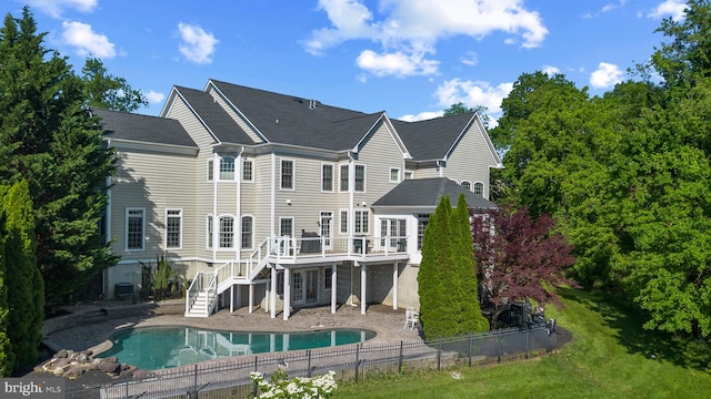 17621 Auburn Village Dr, Sandy Spring, MD 20860 - back of house featuring stairs, a deck, a patio area, and a shingled roof