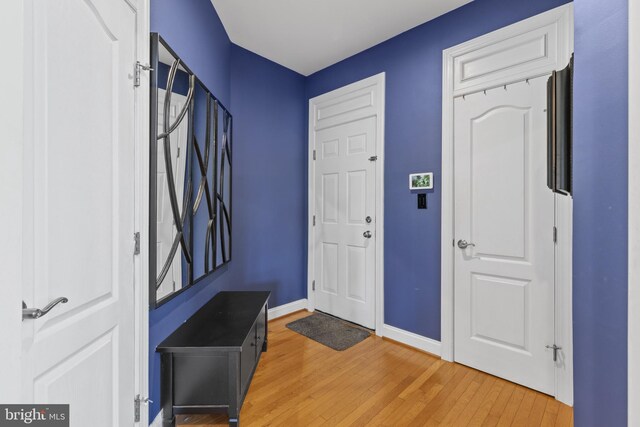 17621 Auburn Village Dr, Sandy Spring, MD 20860 - entryway with light wood finished floors and baseboards