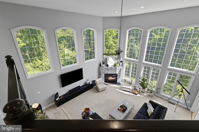 17621 Auburn Village Dr, Sandy Spring, MD 20860 - living area featuring carpet, a stone fireplace, baseboards, and recessed lighting