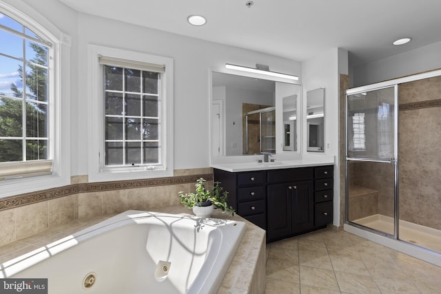 17621 Auburn Village Dr, Sandy Spring, MD 20860 - full bathroom featuring a stall shower, vanity, and a whirlpool tub