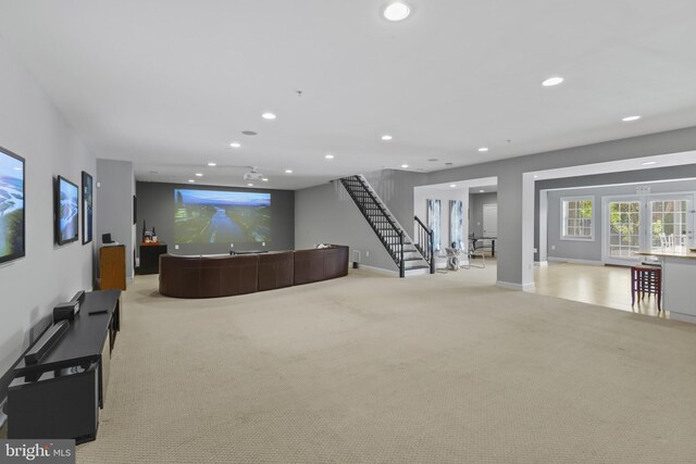 17621 Auburn Village Dr, Sandy Spring, MD 20860 - living area featuring light colored carpet, recessed lighting, baseboards, and stairway