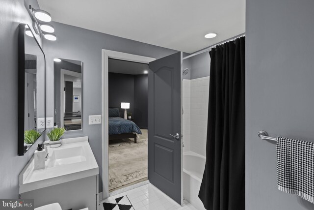 17621 Auburn Village Dr, Sandy Spring, MD 20860 - bathroom with shower / tub combo with curtain, vanity, and connected bathroom