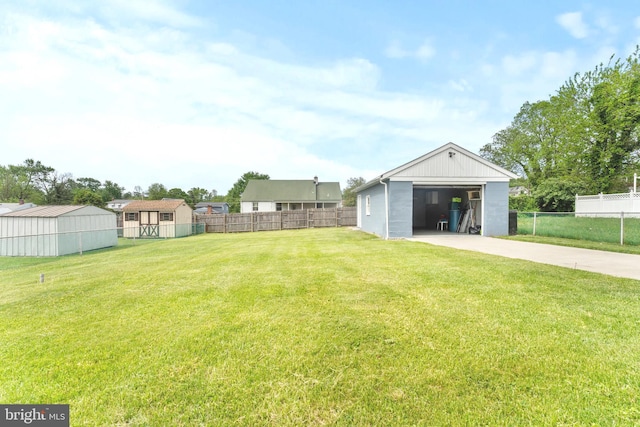5911 Cecil Ave, Baltimore, MD 21207 - view of yard with an outbuilding and a detached garage