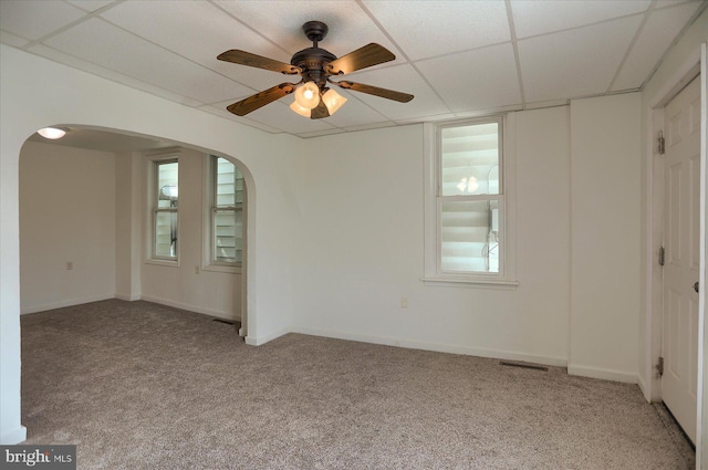 21 E Allen St, Mechanicsburg, PA 17055 - spare room featuring carpet floors, arched walkways, a ceiling fan, and baseboards