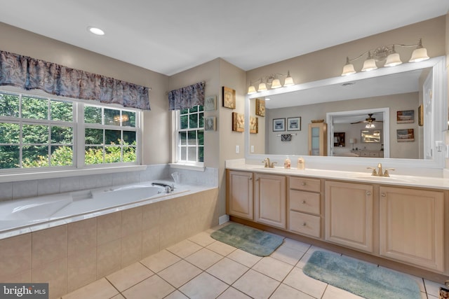 8139 Showcase Ct, Pasadena, MD 21122 - bathroom featuring tile patterned floors, a bath, double vanity, and ceiling fan