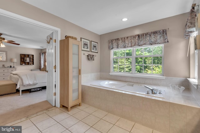 8139 Showcase Ct, Pasadena, MD 21122 - ensuite bathroom with tile patterned flooring, a garden tub, and a ceiling fan