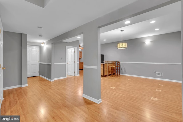 8139 Showcase Ct, Pasadena, MD 21122 - unfurnished living room with light wood-type flooring, baseboards, and recessed lighting