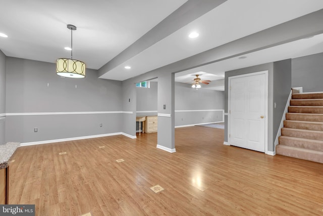 8139 Showcase Ct, Pasadena, MD 21122 - unfurnished living room with light wood finished floors, baseboards, a ceiling fan, stairway, and recessed lighting